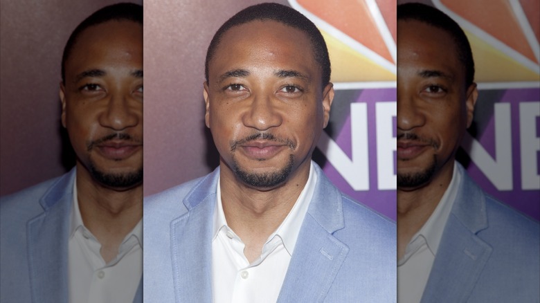 Damon Gupton smiling on red carpet