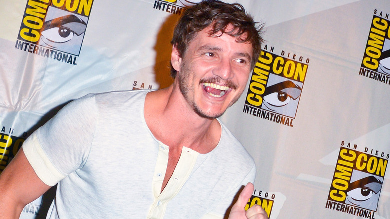 Pedro Pascal smiling, giving a thumbs up