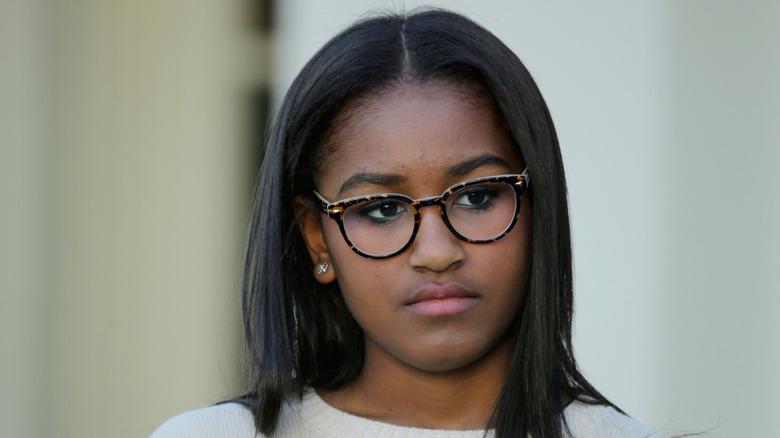 Sasha Obama wearing glasses
