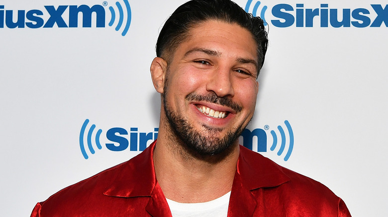 Brendan Schaub grinning at SiriusXM