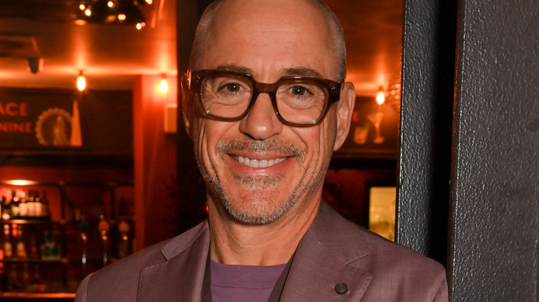 Robert Downey Jr. beaming in glasses