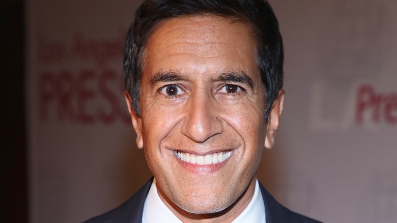 Sanjay Gupta smiling at event