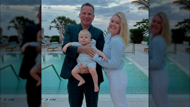 Karoline Leavitt and Nicholas Riccio pose with their son on vacation.