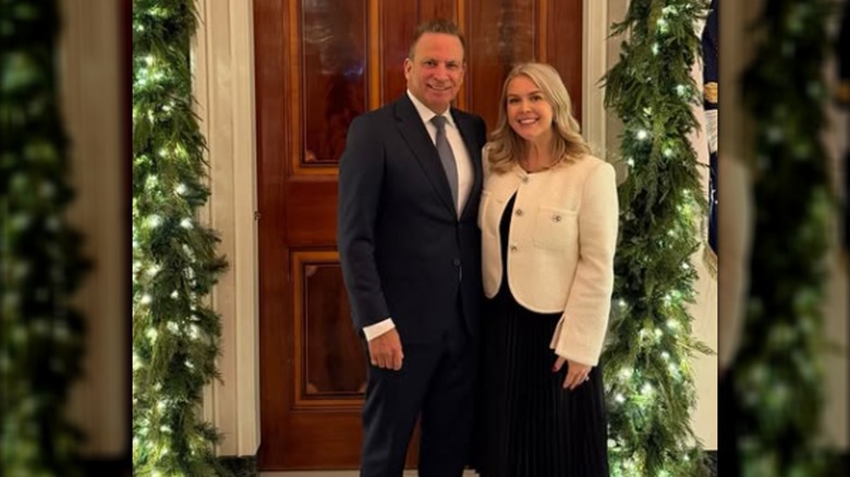 Karoline Leavitt and Nicholas Riccio pose together at the White House Christmas party.