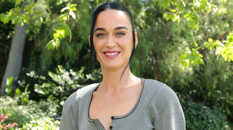 Katy Perry posing at a luncheon for Academy Award nominees.