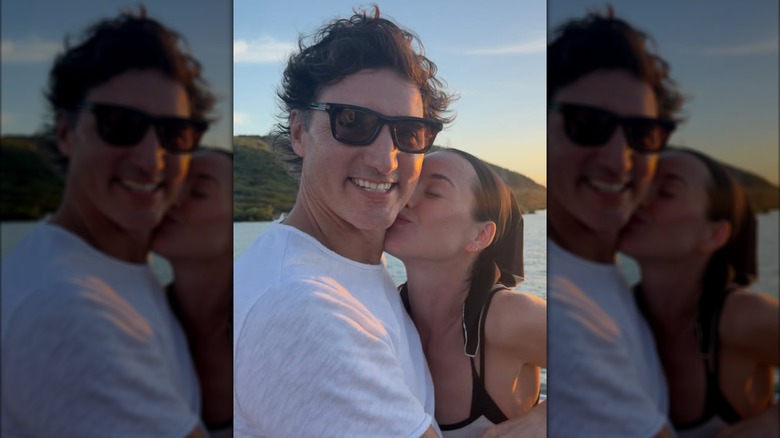 Katy Perry kisses Justin Trudeau on the cheek for a selfie.