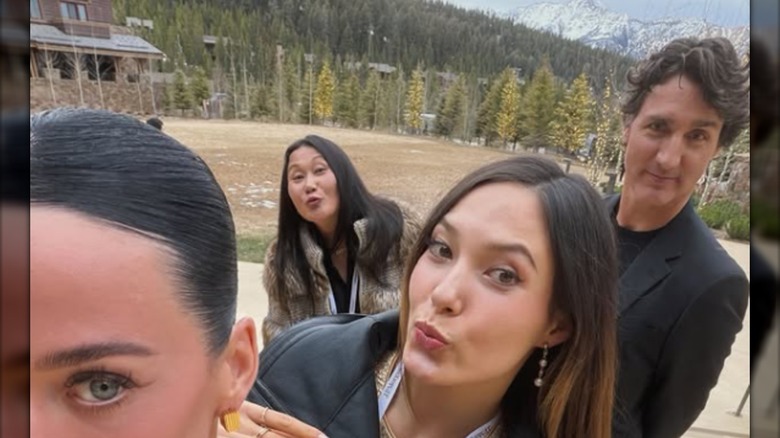 Katy Perry and Justin Trudeau pose with Eileen Gu and her mom.