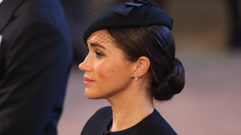 Meghan Markle looking ahead in black