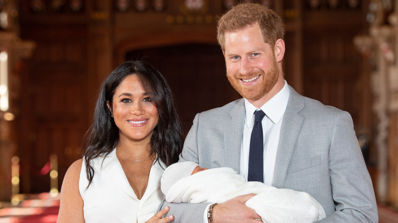 Meghan Markle and Prince Harry pose with newborn Archie in 2019