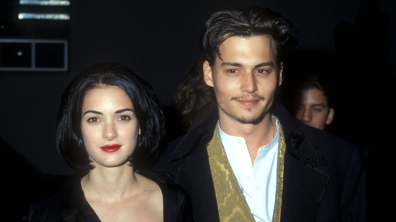 Winona Ryder and Johnny Depp attending a premiere