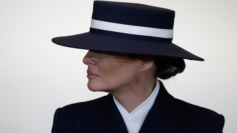 Melania Trump during the 2025 inauguration wearing a black and white hat