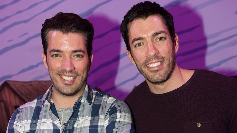 Drew and Jonathan Scott smiling