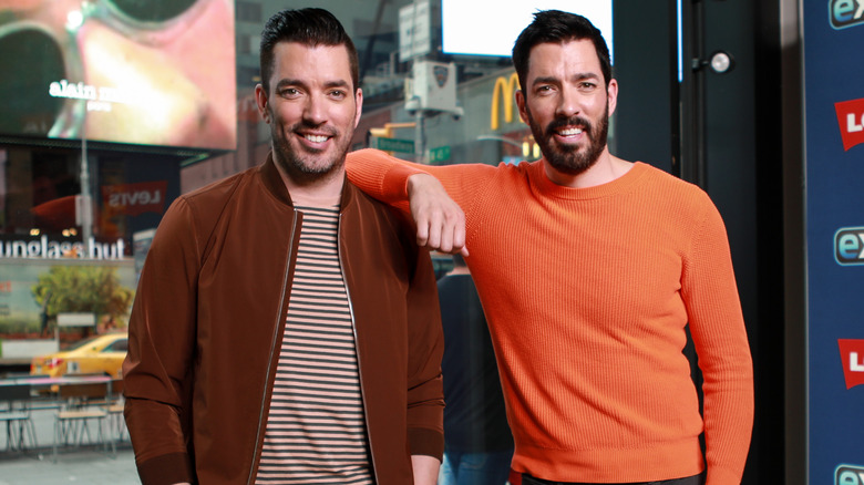Drew and Jonathan Scott smiling