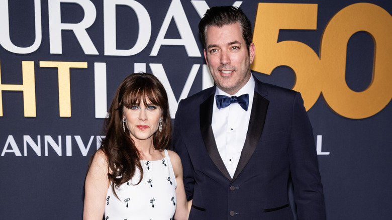 Jonathan Scott Zooey Deschanel smirking