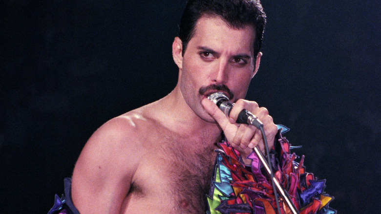 Freddie Mercury performing
