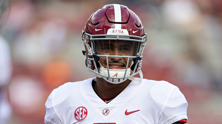 Jalen Hurts in football helmet, smiling