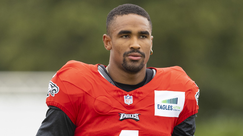 Jalen Hurts in training, looking away