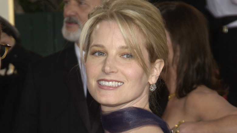 Bridget Fonda smiling blonde sweeping bangs