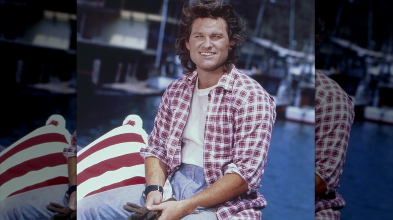 Kurt Russell on a boat.
