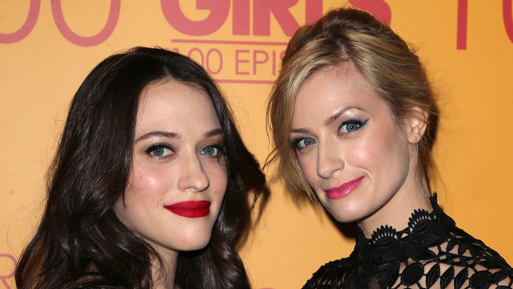 Kat Dennings and Beth Behrs on a red carpet
