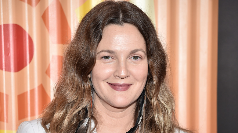 Drew Barrymore posing at an event