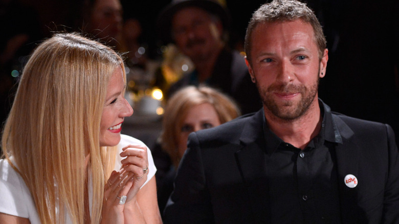 Gwyneth Paltrow smiling at Chris Martin