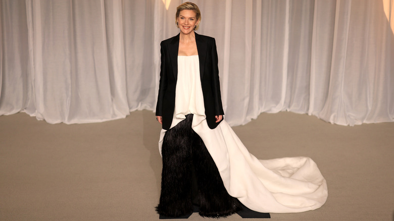 Rhea Seehorn smiling in an all black and white outfit at the 6th Annual Academy Museum Gala