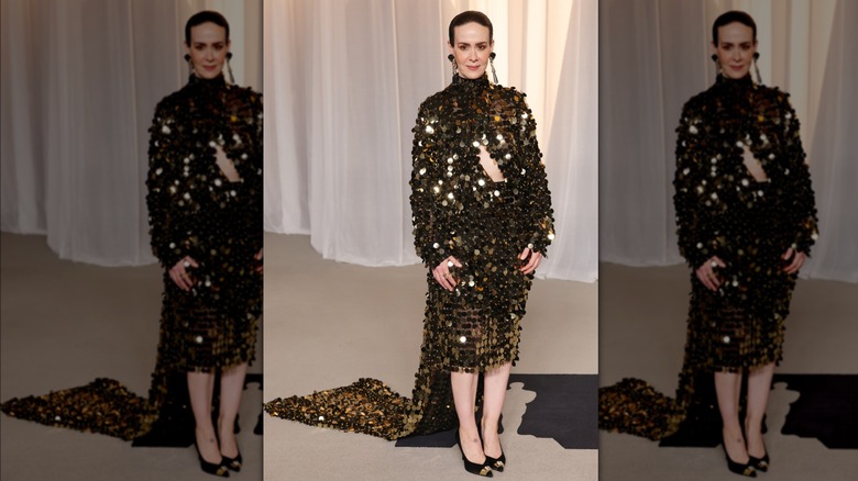 Sarah Paulson in a long gold dress at the 6th Annual Academy Museum Gala