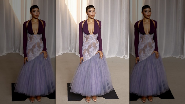 Tinashe wearing a dress with three different shades of purple at the 6th Annual Academy Museum Gala