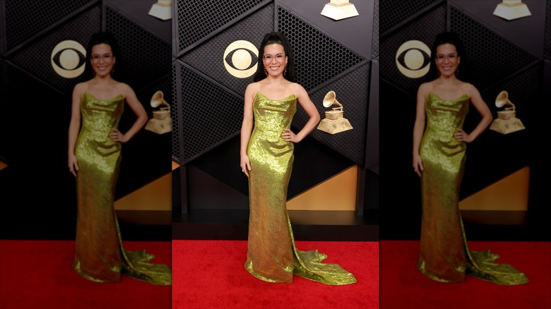 Ali Wong in a green dress