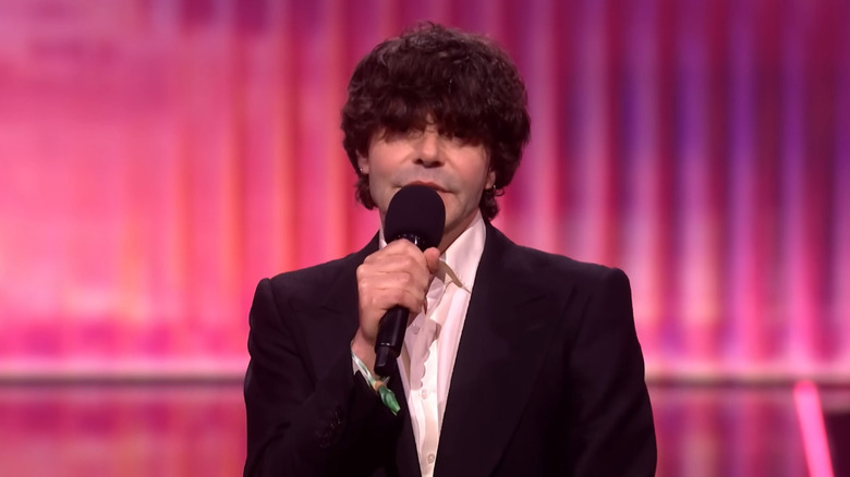 Charlatans frontman Tim Burgess speaks at the 2026 BRITs