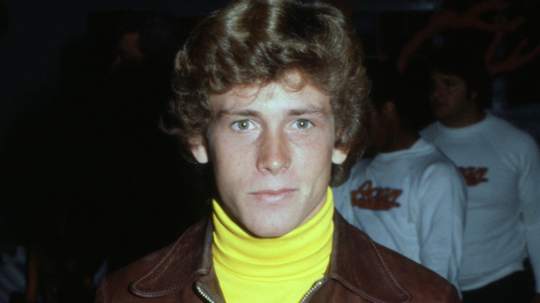 Willie Aames poses for a photo
