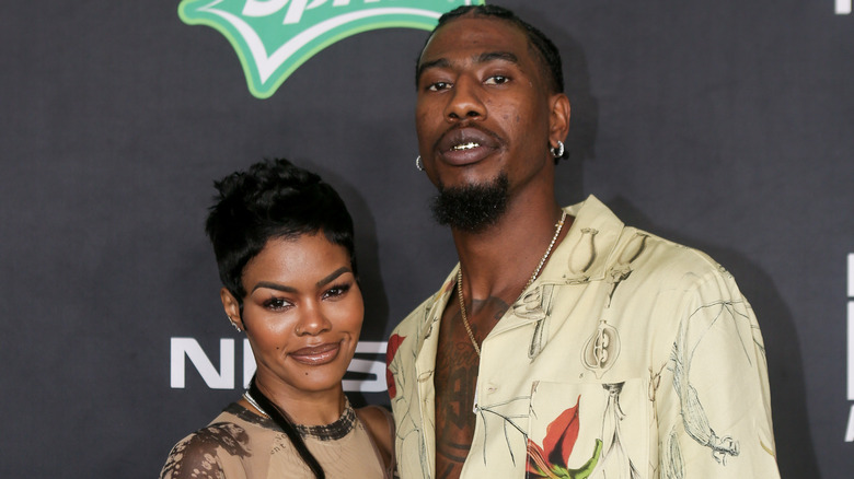 Teyana Taylor and Iman Shumpert, posing