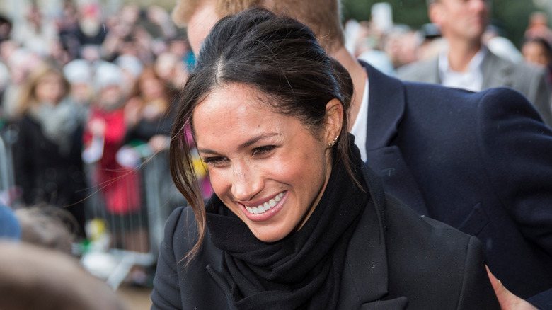 Meghan Markle grinning