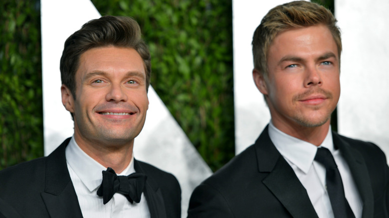 Ryan Seacrest and Derek Hough posing together in 2013.
