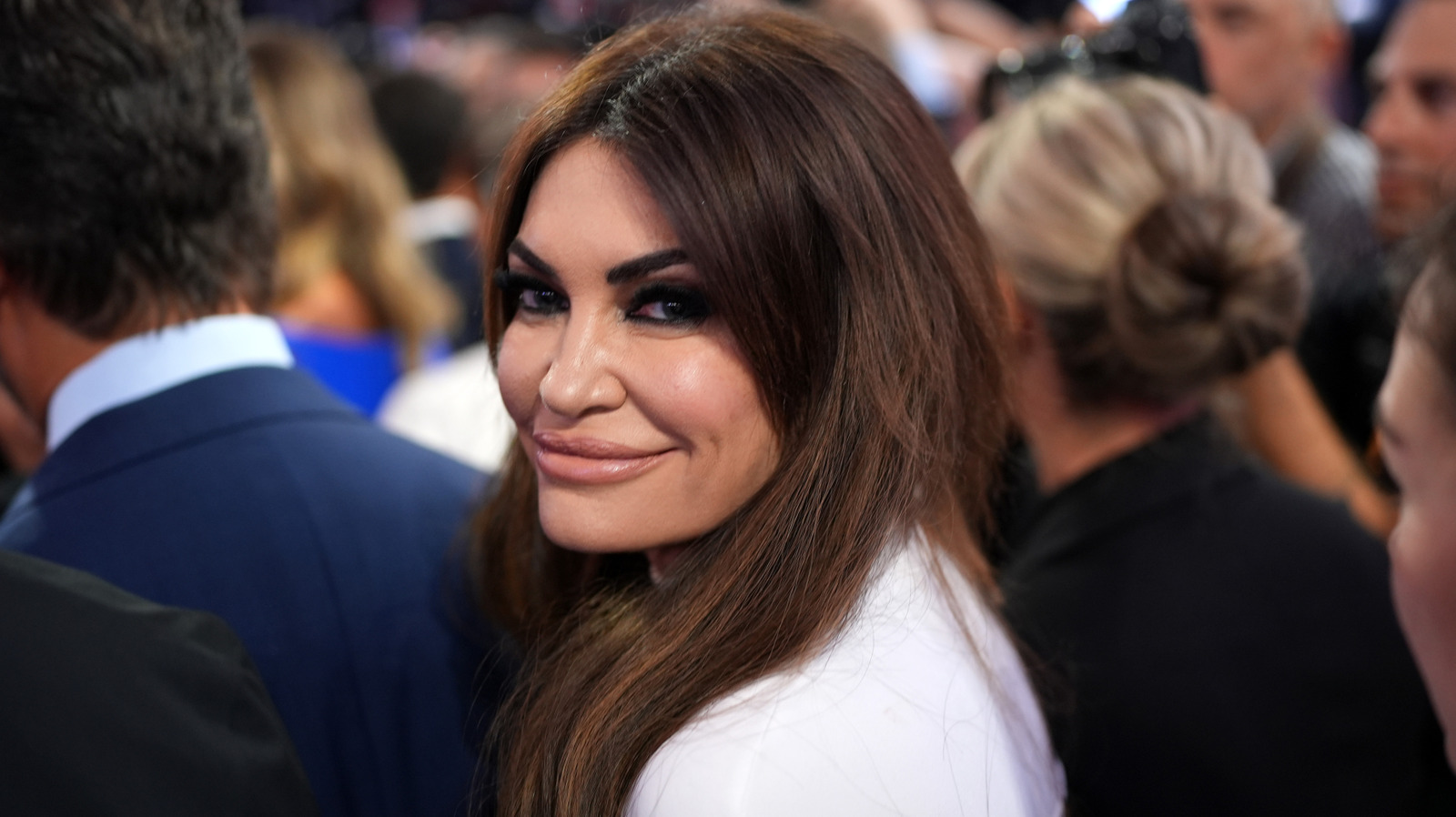 kimberly guilfoyle purple dress After hearing that Party City is closing all its stores, Kimberly Guilfoyle wailed, "I'm the Ambassador to Greece! Where am I supposed to shop? I bought this outfit in the window treatment
