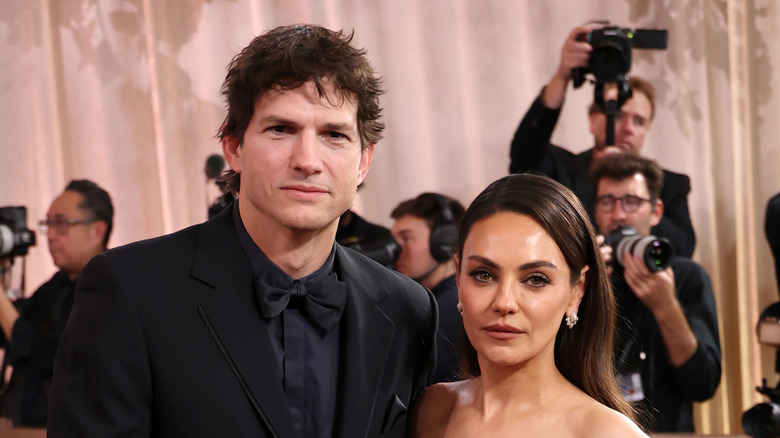 Ashton Kutcher and Mila Kunis attend the Golden Globes
