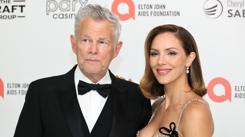 David Foster and Katharine McPhee posing at event