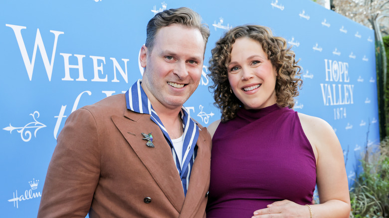 Erin Krakow and Ben Rosenbaum smiling and posing for a photo together.