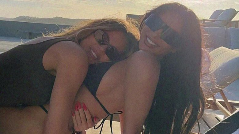 Khloe and Kim Kardashian hugging