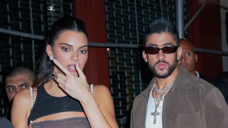 Bad Bunny and Kendall Jenner walking