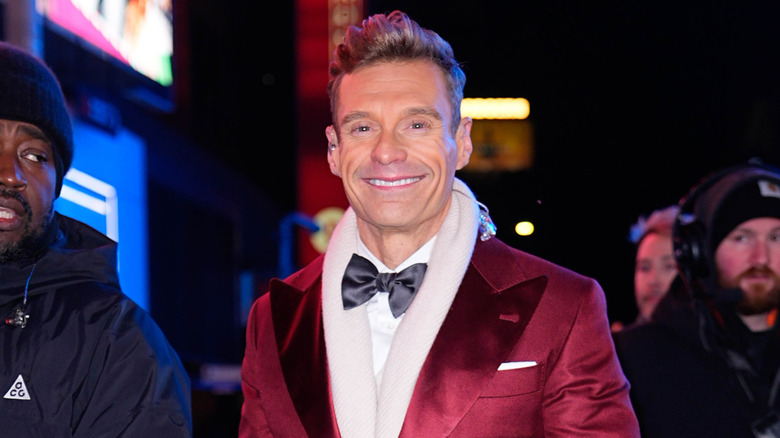 Ryan Seacrest smiling for a photo