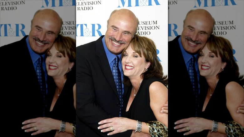 Dr. Phil and wife Robin McGraw posing happily.