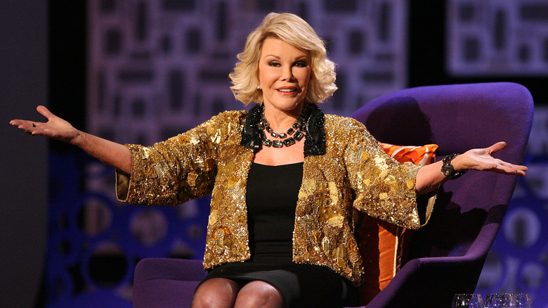 Joan Rivers on a chair