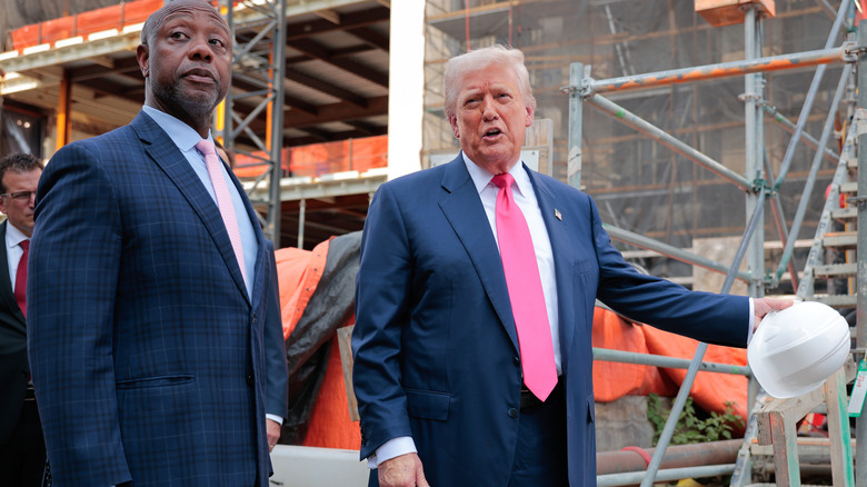 Tim Scott and Donald Trump speaking.