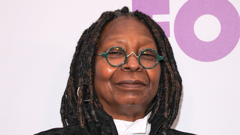 Whoopi Goldberg green glasses