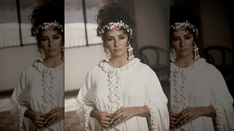 Elizabeth Taylor posing with the Krupp diamond on the set of "Boom."