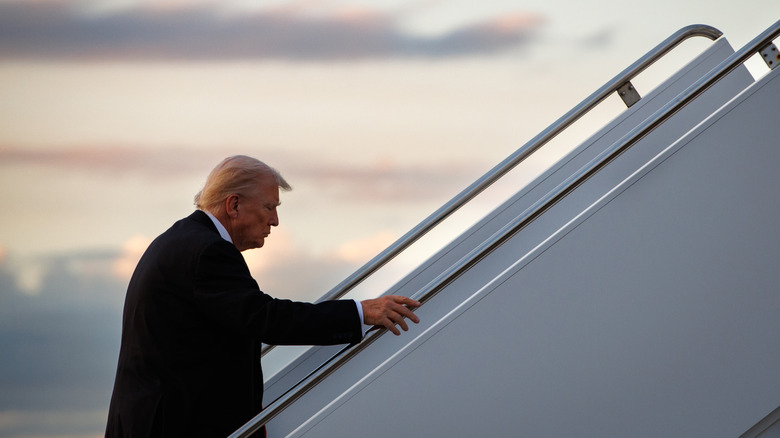 U.S. President Donald Trump boarding Air Force One en route to the White House at Palm Beach International Airport in West Palm Beach, Florida