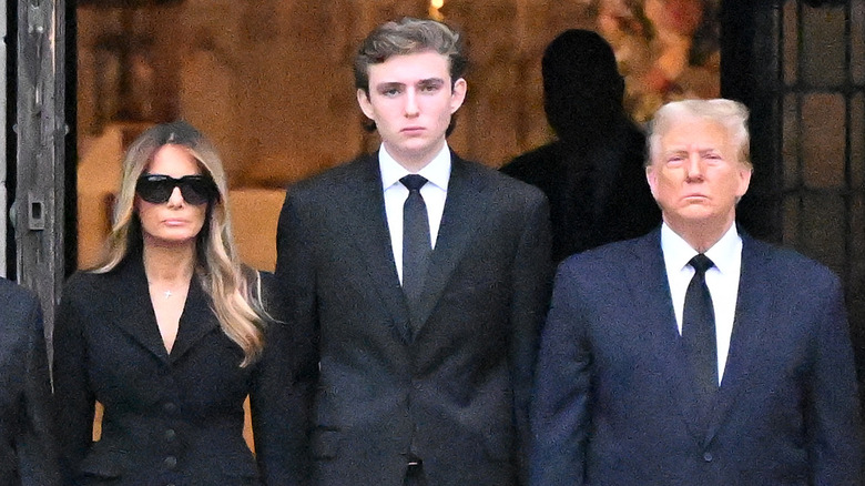Melania Barron Donald Trump posing