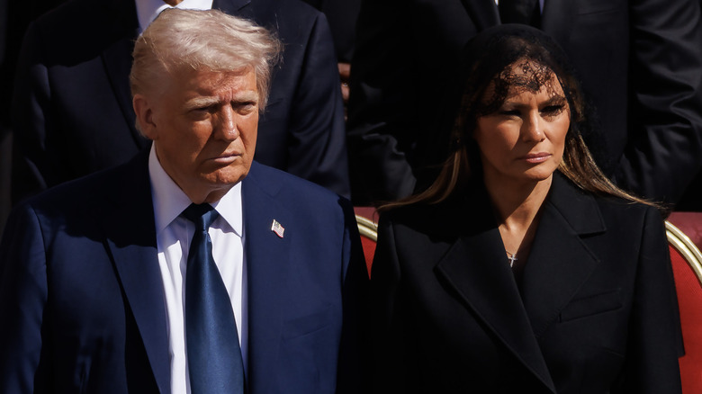 Donald Trump and Melania Trump at a funeral